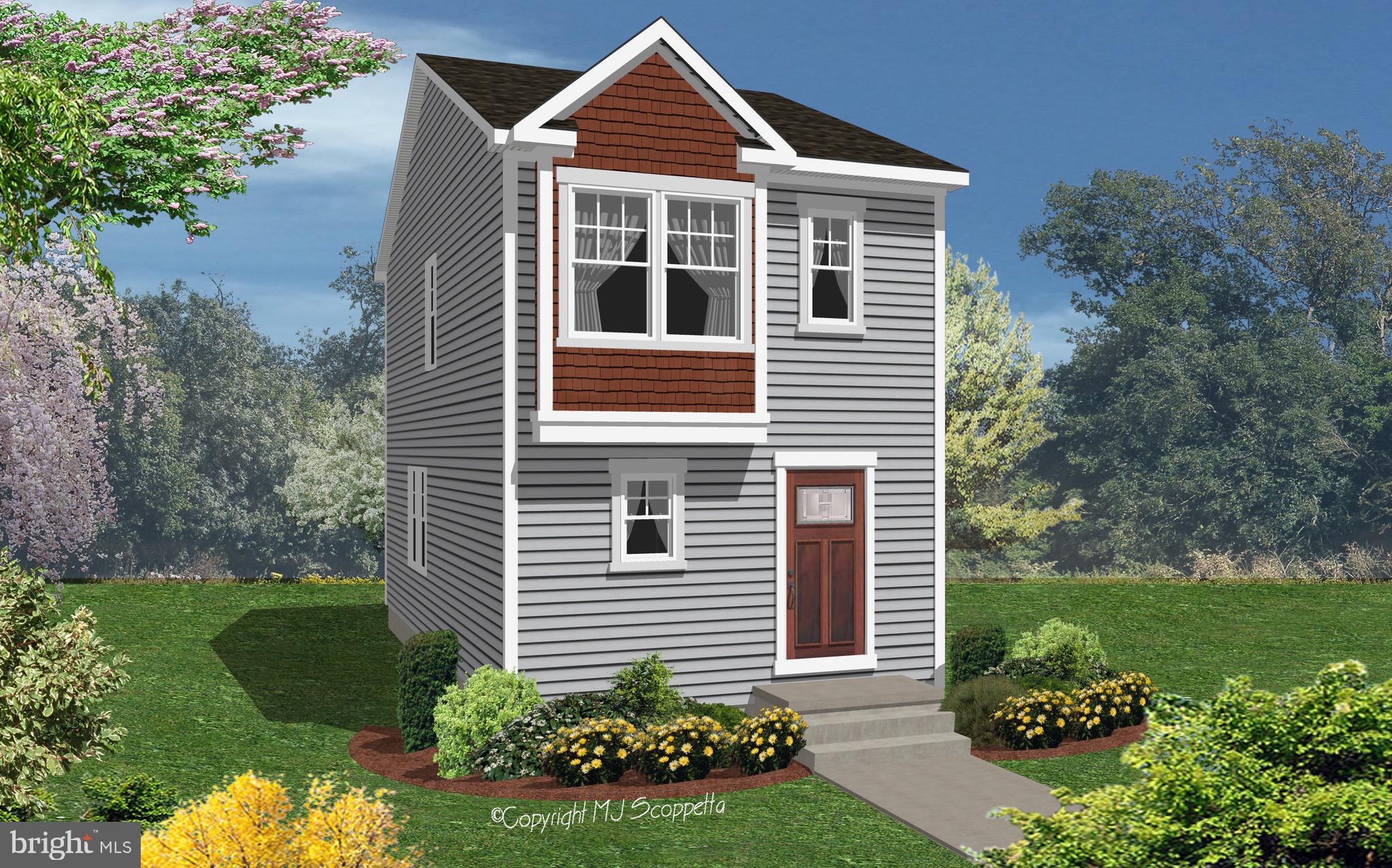 113 Henry Street Bridgeton, NJ 08302 - Photo 2 of 24 a front view of a house with a yard