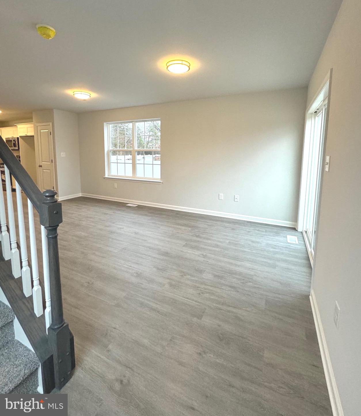 113 Henry Street Bridgeton, NJ 08302 - Photo 10 of 24 an empty room with windows