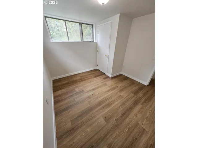 a bathroom with a sink vanity and a mirror