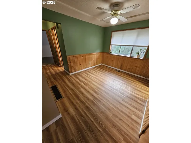 a view of a hallway with entryway