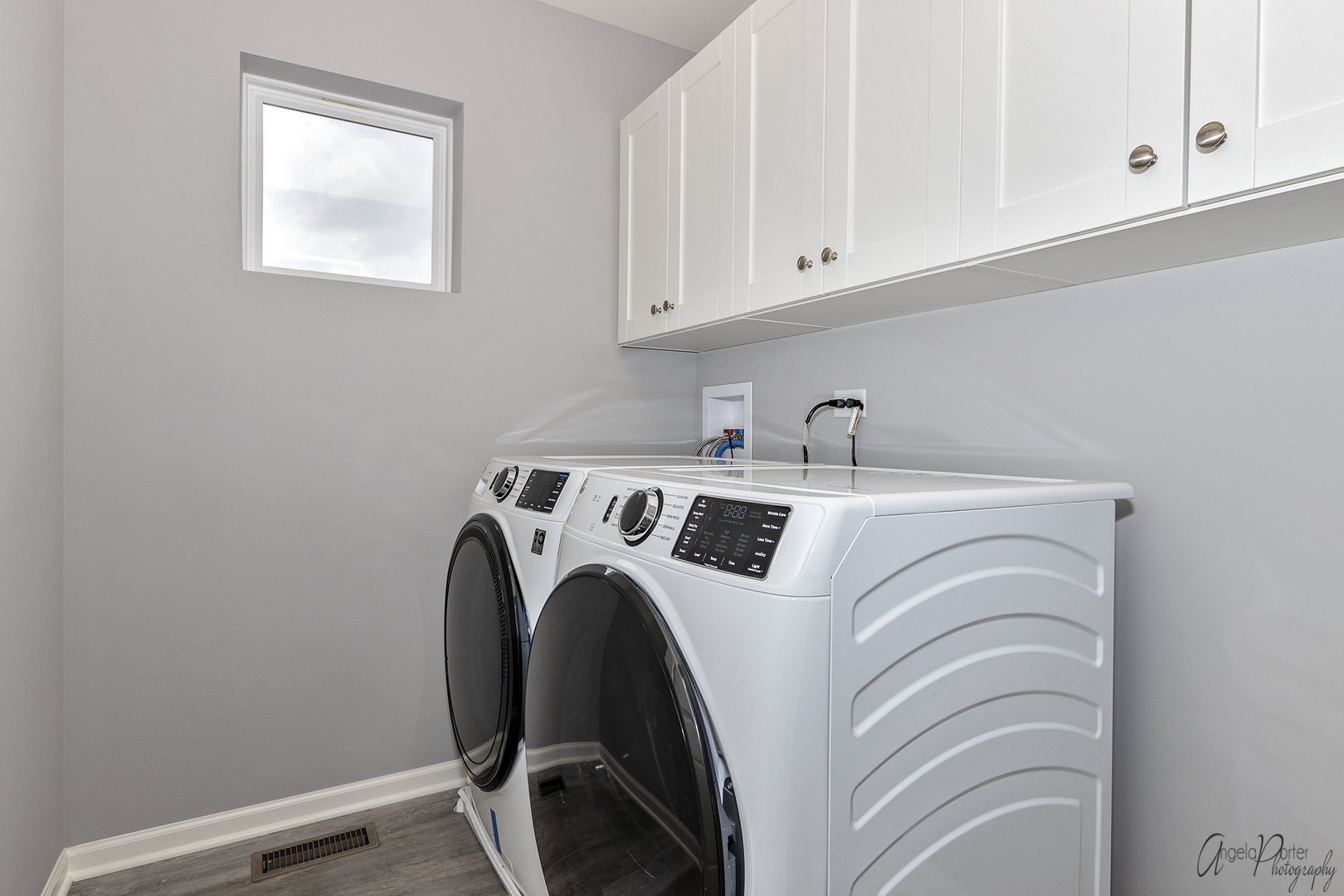 4012 Monica Lane, Unit 2 Johnsburg, IL 60051 - Photo 22 of 33 a utility room with dryer and washer