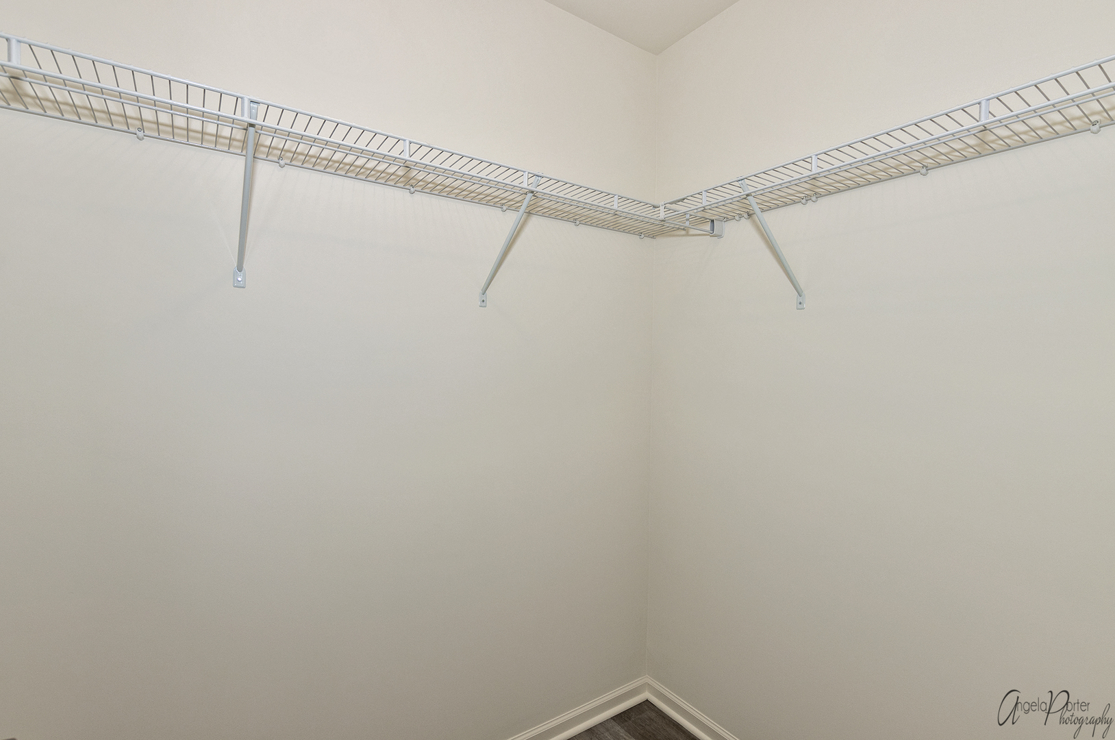 4012 Monica Lane, Unit 2 Johnsburg, IL 60051 - Photo 28 of 33 a view of a room with racks on the wall