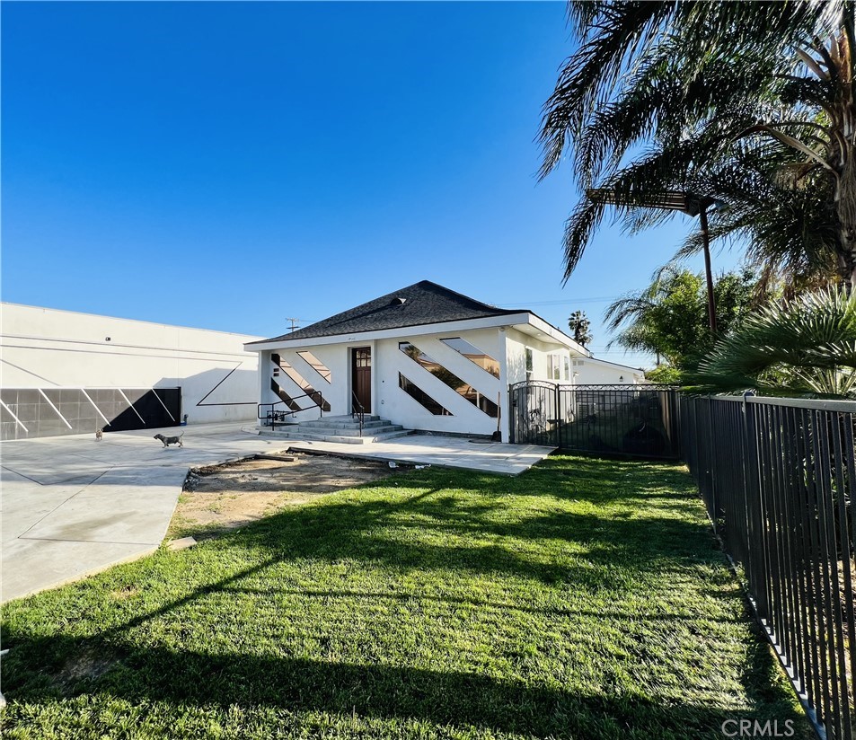 2730 University Avenue Riverside, CA 92507 - Photo 1 of 1 a house with swimming pool in front of it