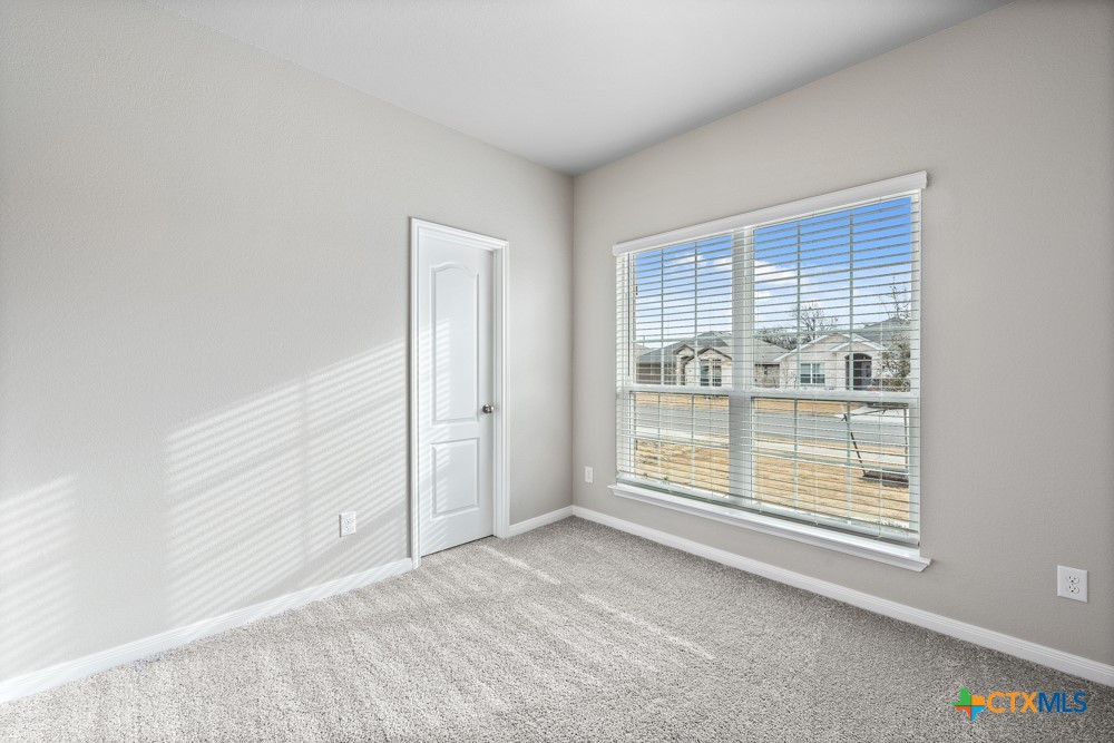 1028 Coriander Road Temple, TX 76501 - Photo 10 of 23 a view of an empty room with a window