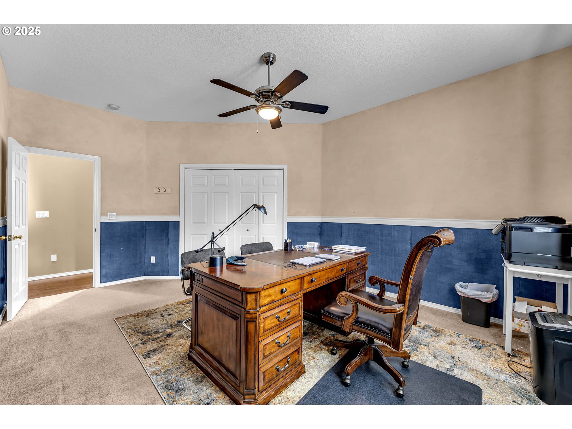 3901 Northwest 150th Circle Vancouver, WA 98685 - Photo 24 of 48 a workspace with furniture and a chandelier
