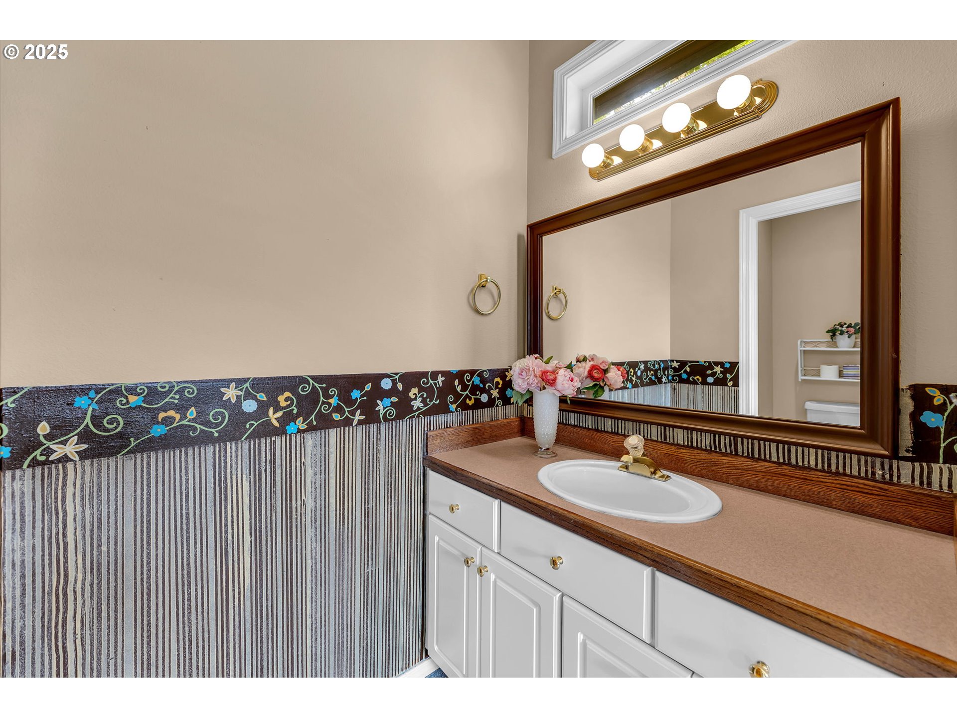 3901 Northwest 150th Circle Vancouver, WA 98685 - Photo 26 of 48 a bathroom with a sink vanity and a mirror