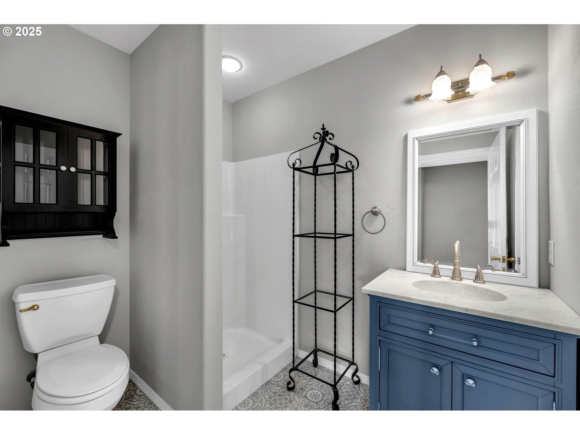 3901 Northwest 150th Circle Vancouver, WA 98685 - Photo 38 of 48 a bathroom with a toilet a sink and mirror