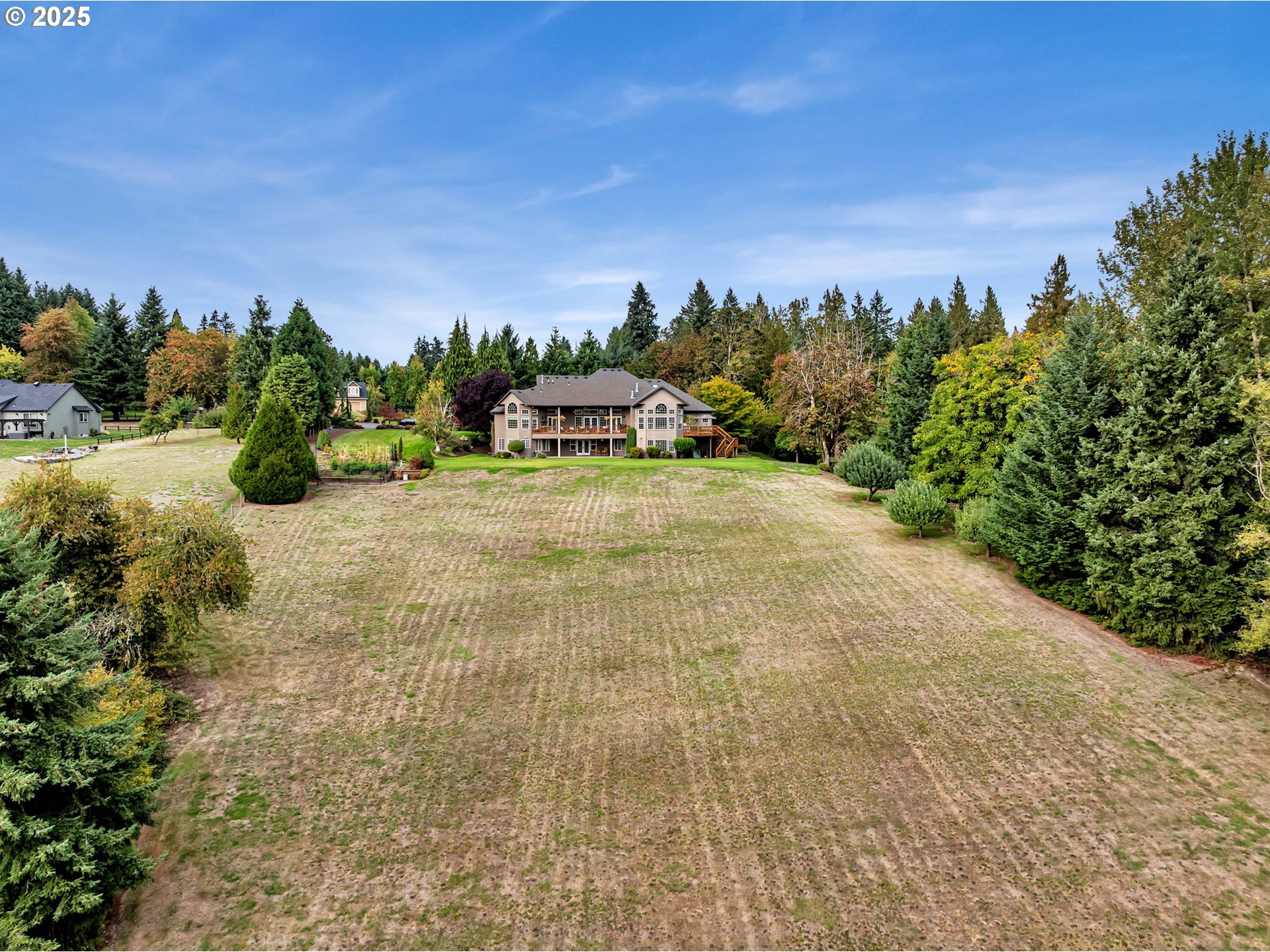 3901 Northwest 150th Circle Vancouver, WA 98685 - Photo 39 of 48 a view of a yard with plants and a building