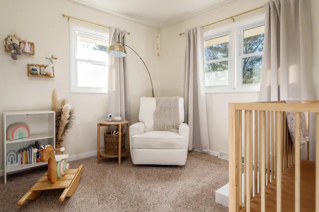 a living room with furniture and a table
