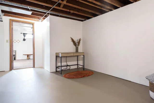 a view of a garage with wooden wall