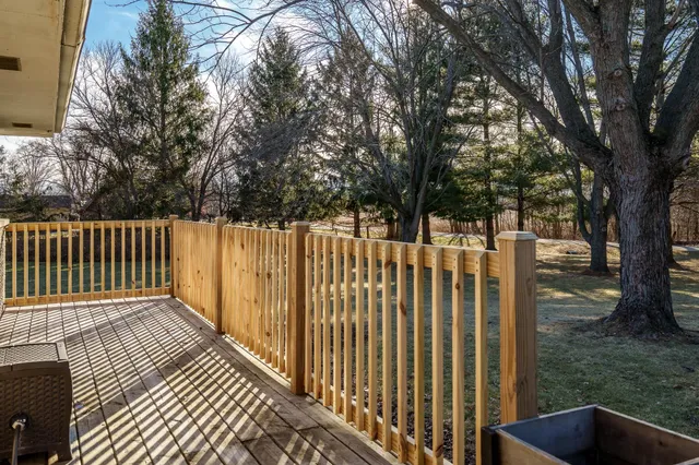 a view of a wooden fence