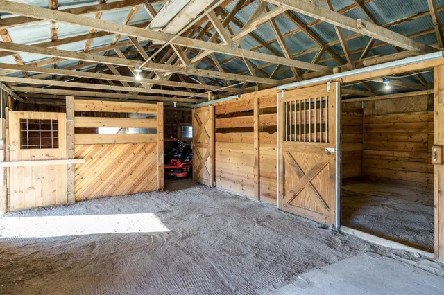 a view of a house with backyard sitting area and porch