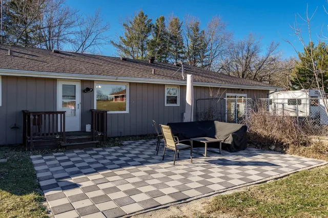 a view of roof and yard