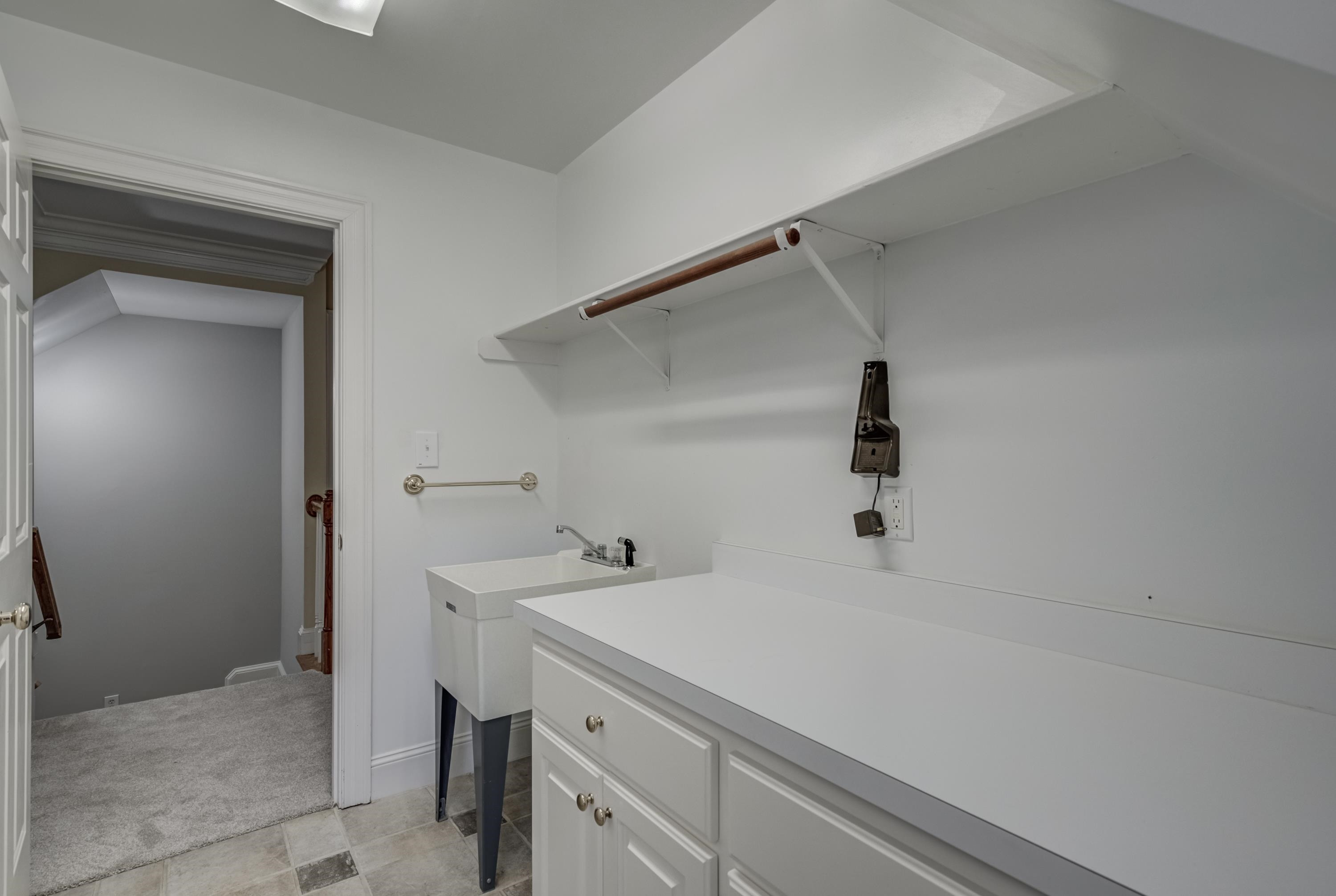 4732 Sharpstone Lane Raleigh, NC 27615 - Photo 49 of 76 Laundry Room with Cabinets