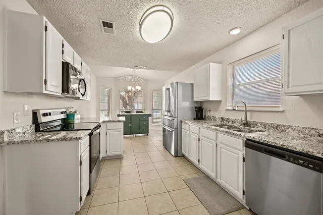 $330,000 | 7636 Misty Ridge Drive North, Fort Worth, TX 76137