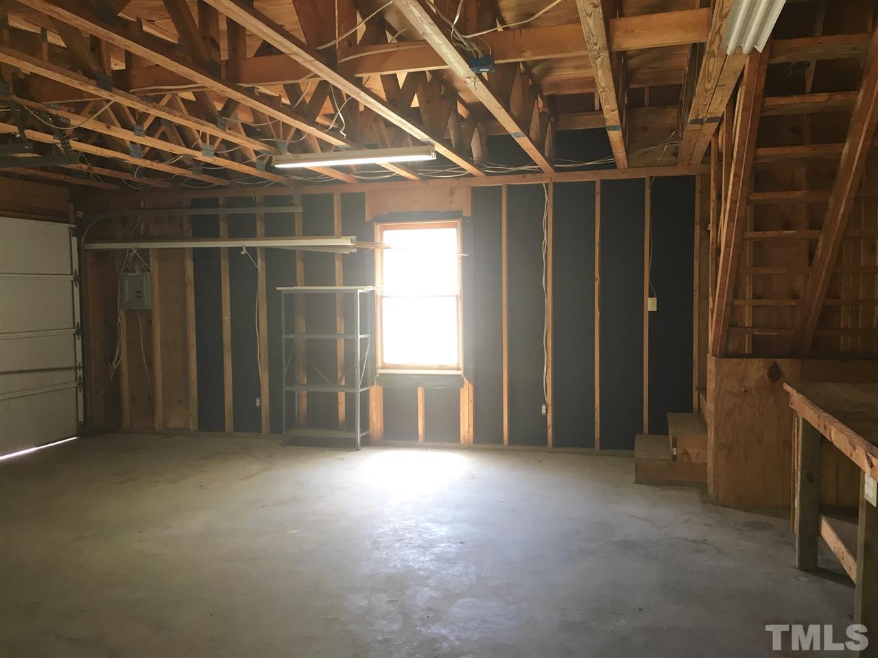 1612 Ridge Road Zebulon, NC 27597 - Photo 11 of 17 a view of an empty room with a window