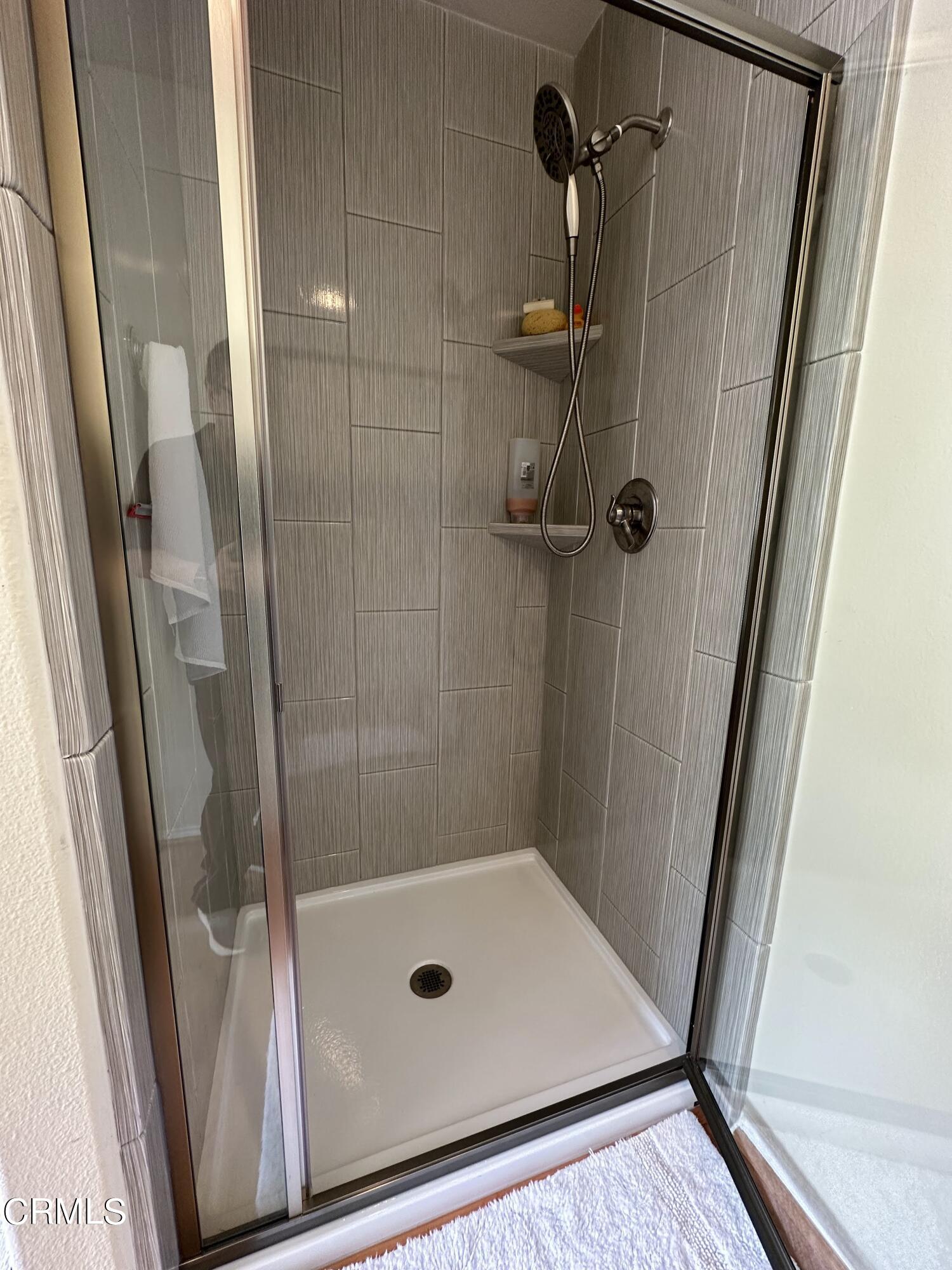 803 Noontide Way Oxnard, CA 93035 - Photo 16 of 26 a bathroom with a shower