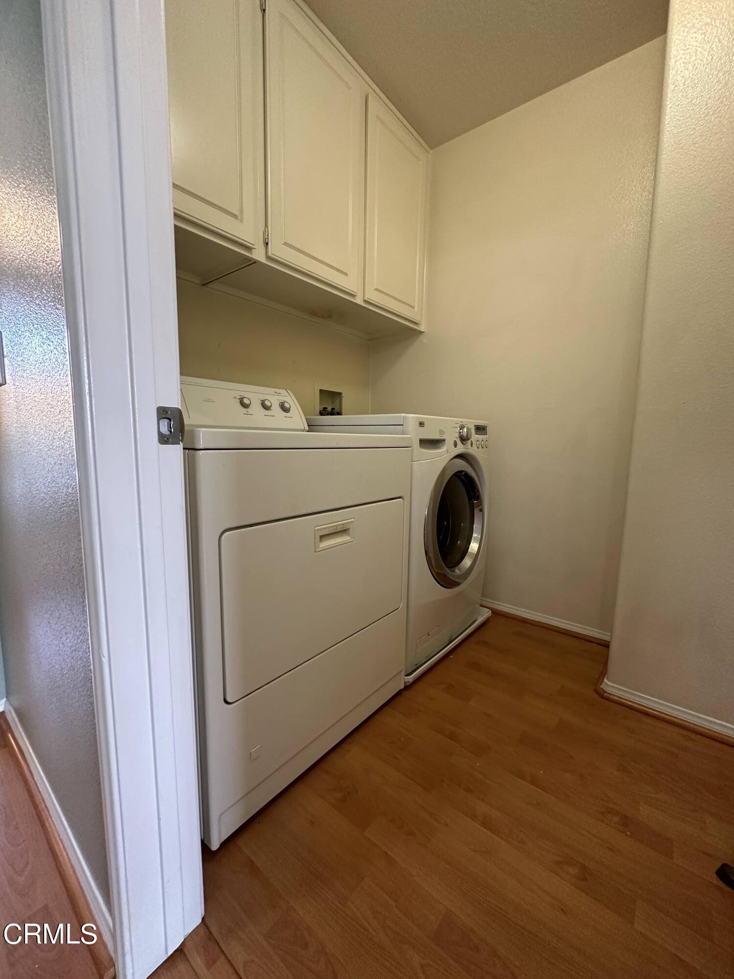 803 Noontide Way Oxnard, CA 93035 - Photo 22 of 26 a utility room with dryer and washer