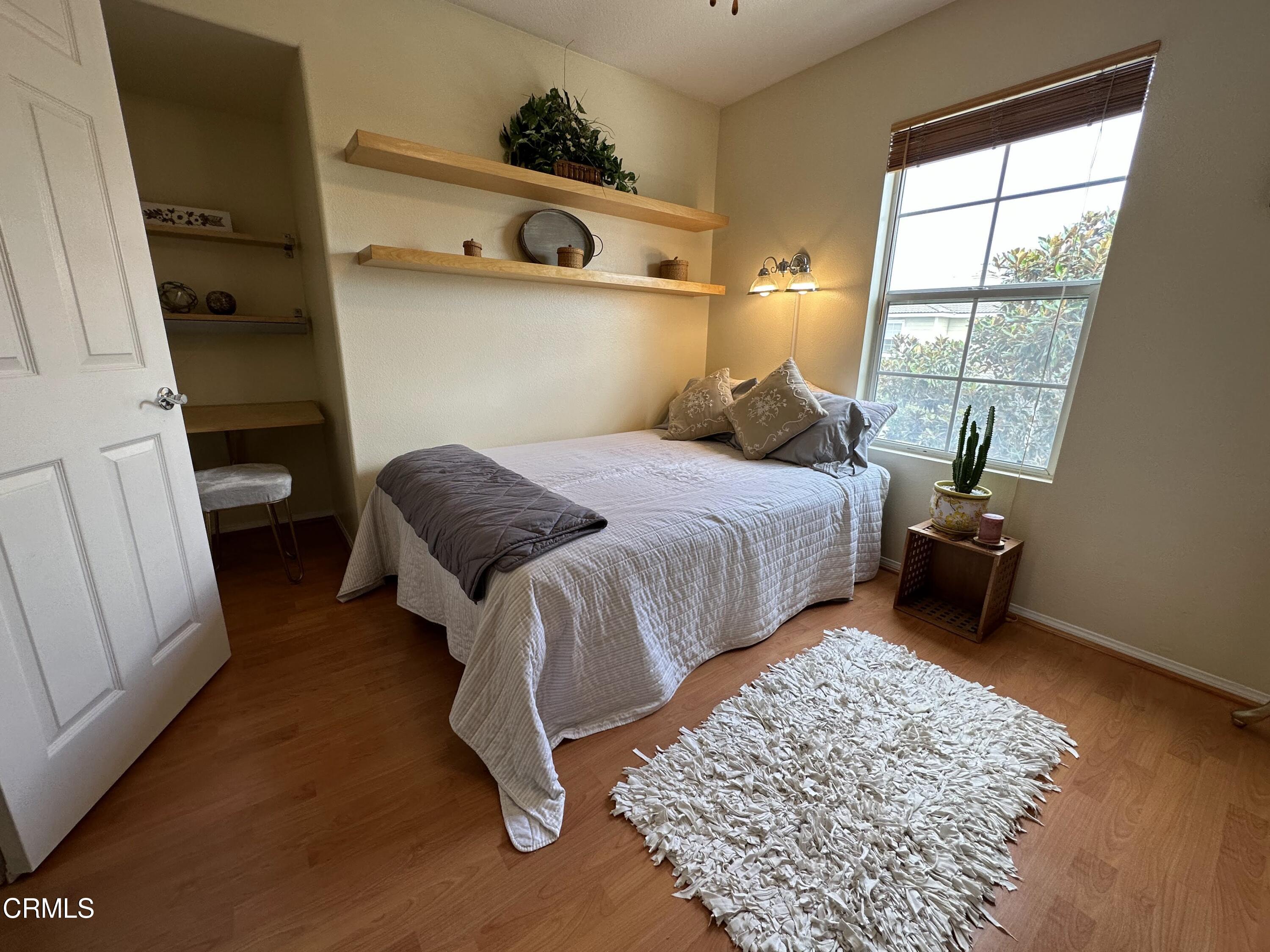 803 Noontide Way Oxnard, CA 93035 - Photo 25 of 26 a bedroom with a bed and a window