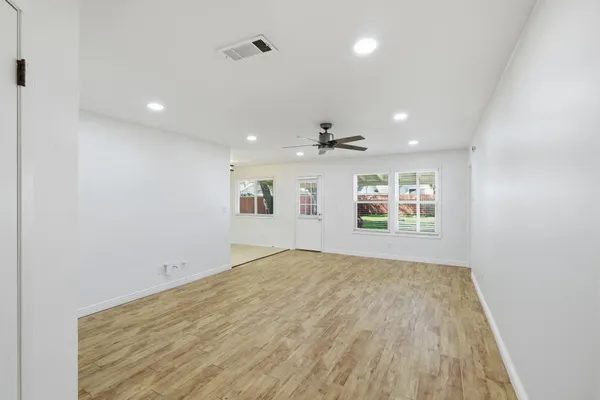 an empty room with windows