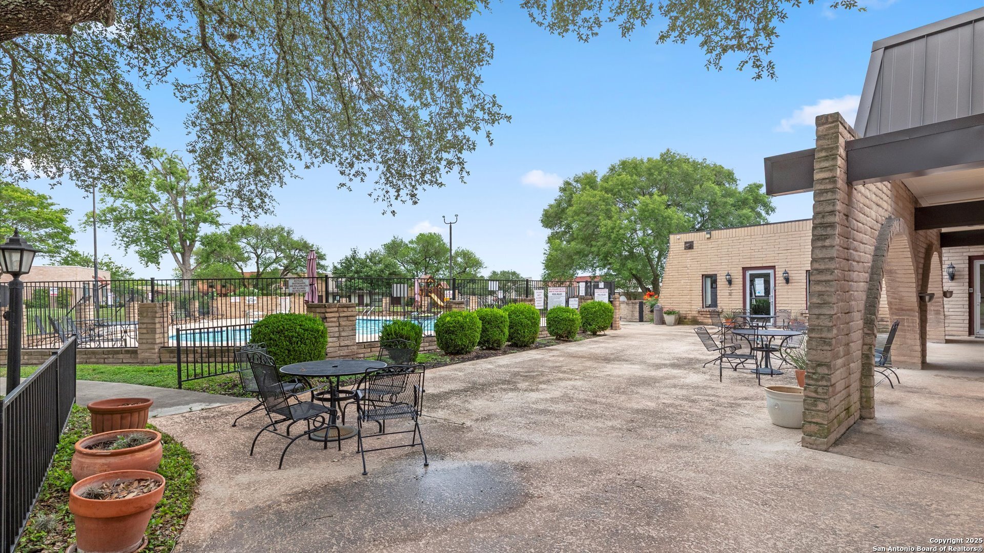 6750 Crown Ridge San Antonio, TX 78239 - Photo 27 of 31 a view of a patio with a table and chairs