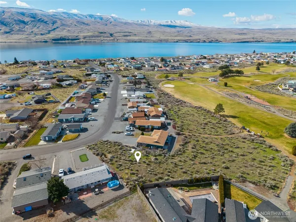 a view of a city with an ocean view
