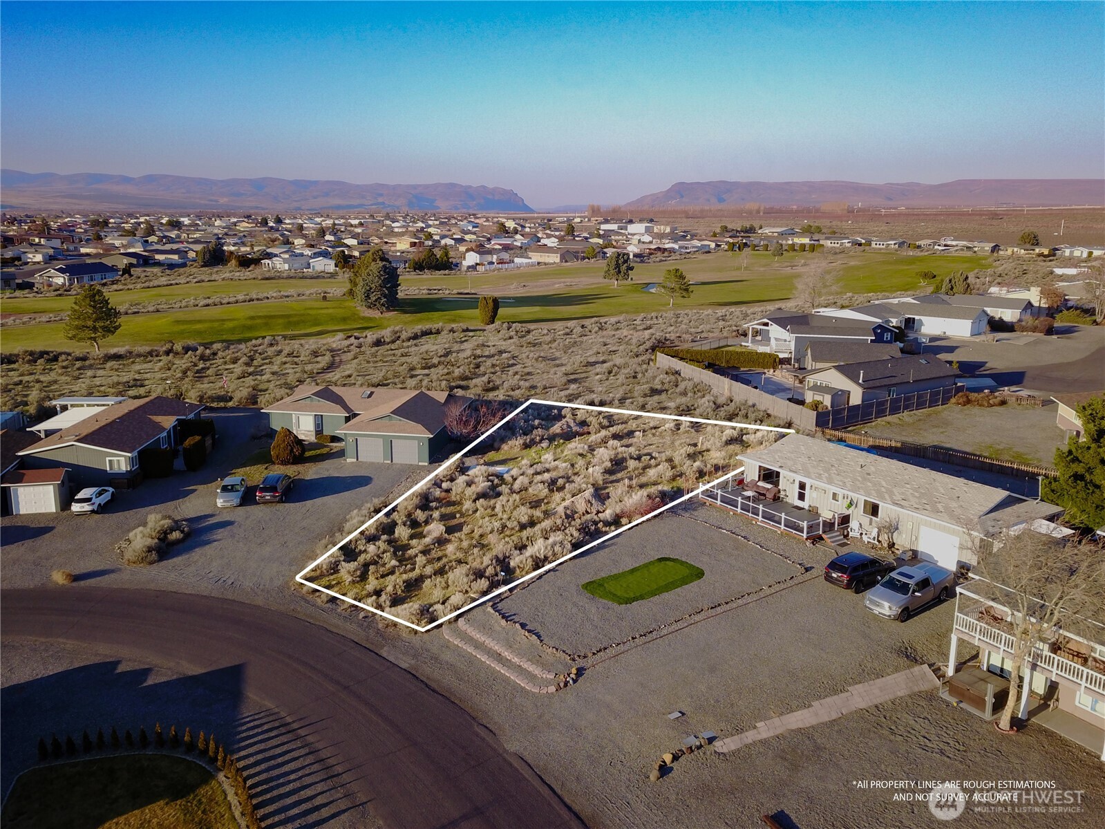 416 Autumn Loop Mattawa, WA 99349 - Photo 5 of 13 an aerial view of a city with lawn chairs