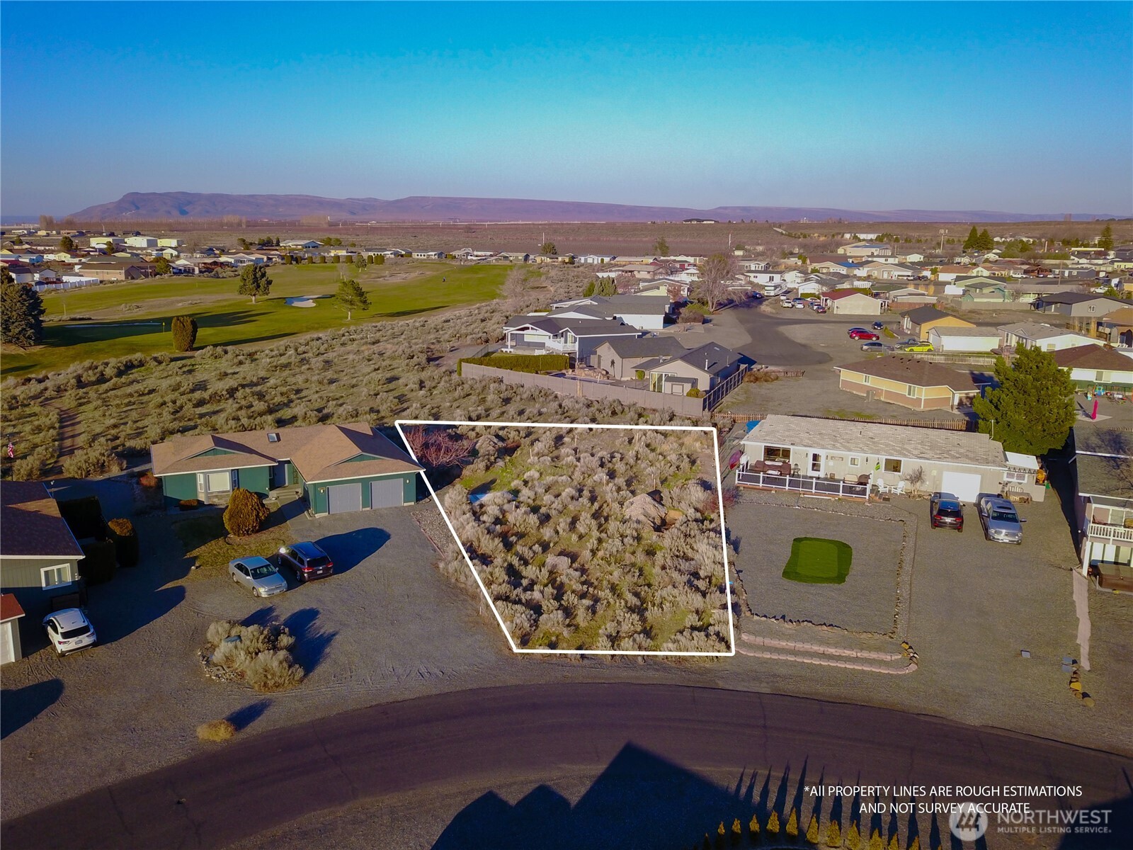 416 Autumn Loop Mattawa, WA 99349 - Photo 6 of 13 an aerial view of a city