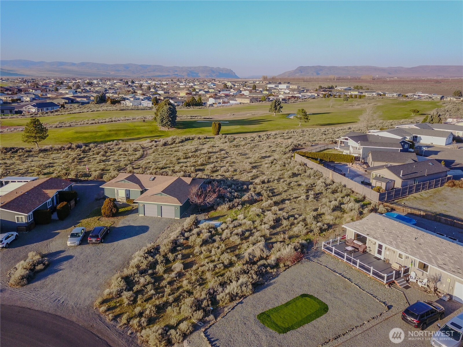 416 Autumn Loop Mattawa, WA 99349 - Photo 8 of 13 an aerial view of a house with outdoor space ocean view