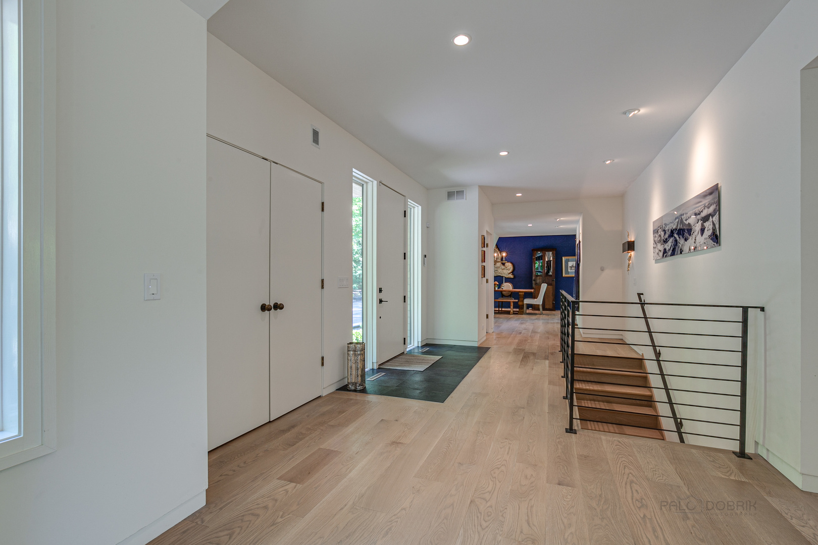 1055 Ringwood Road Lake Forest, IL 60045 - Photo 15 of 59 a view of a hallway with stairs and a furniture