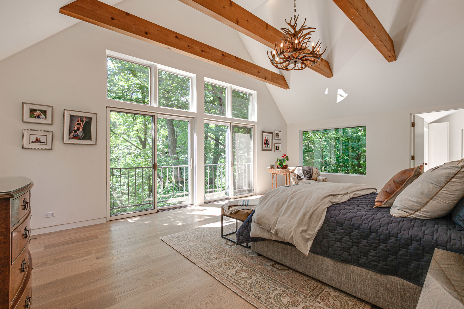 1055 Ringwood Road Lake Forest, IL 60045 - Photo 26 of 59 a bed sitting in a spacious bedroom next to a window