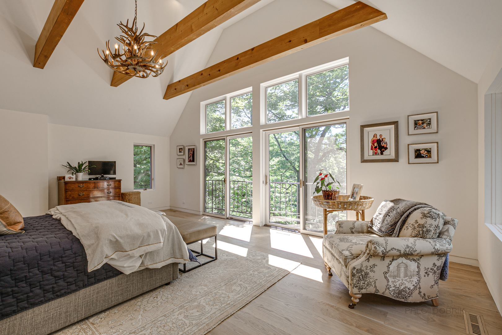 1055 Ringwood Road Lake Forest, IL 60045 - Photo 28 of 59 a bedroom with a bed and a couch