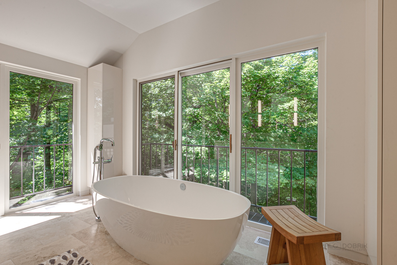 1055 Ringwood Road Lake Forest, IL 60045 - Photo 32 of 59 a bath tub sitting in a bedroom next to a window