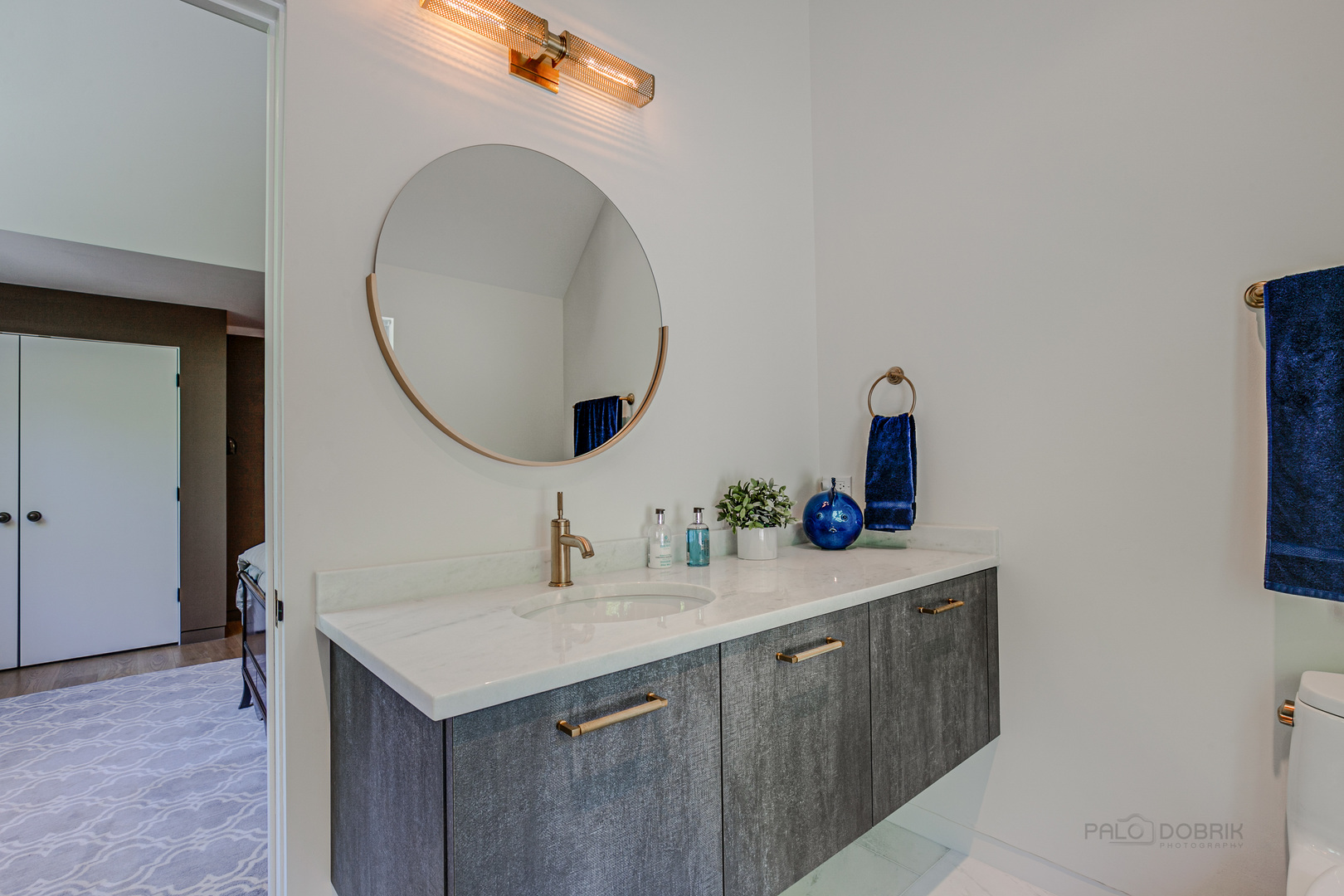 1055 Ringwood Road Lake Forest, IL 60045 - Photo 36 of 59 a bathroom with a sink and a mirror