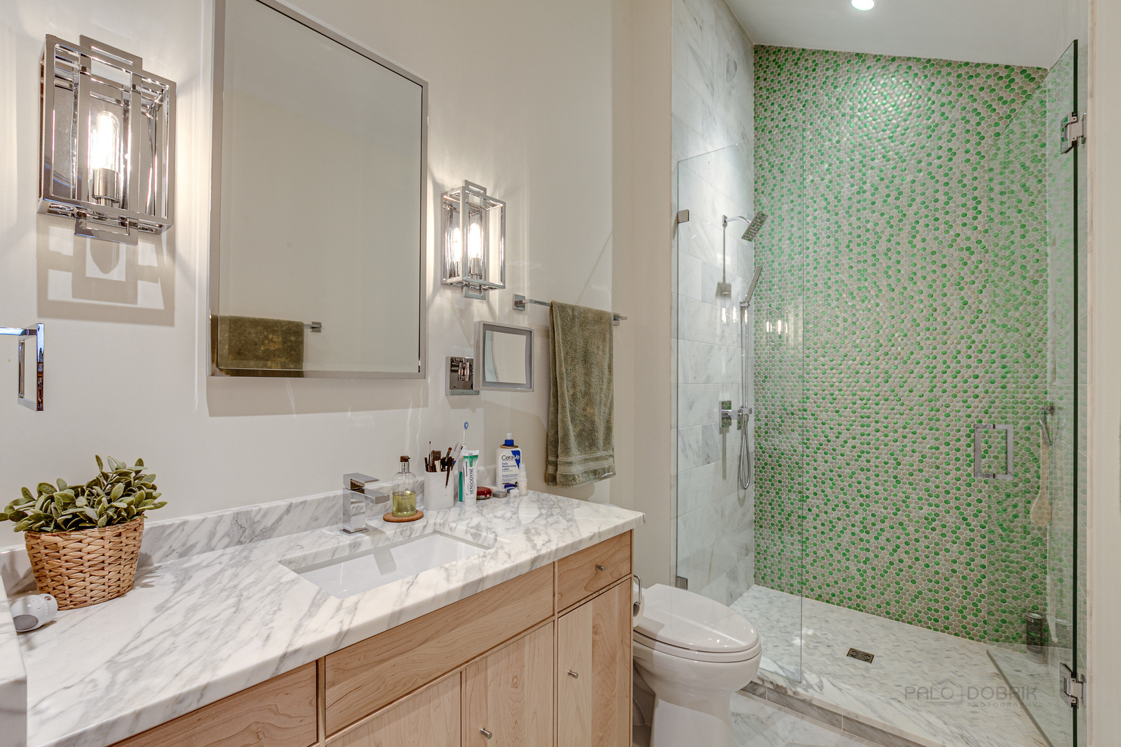 1055 Ringwood Road Lake Forest, IL 60045 - Photo 39 of 59 a bathroom with a granite countertop sink toilet and shower