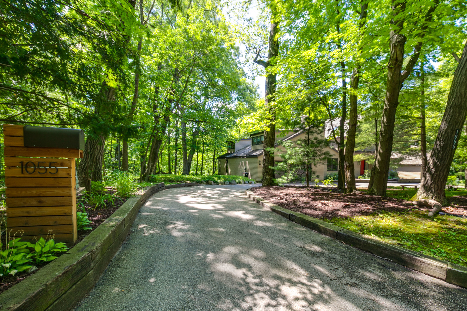 1055 Ringwood Road Lake Forest, IL 60045 - Photo 56 of 59 a view of a backyard with tree