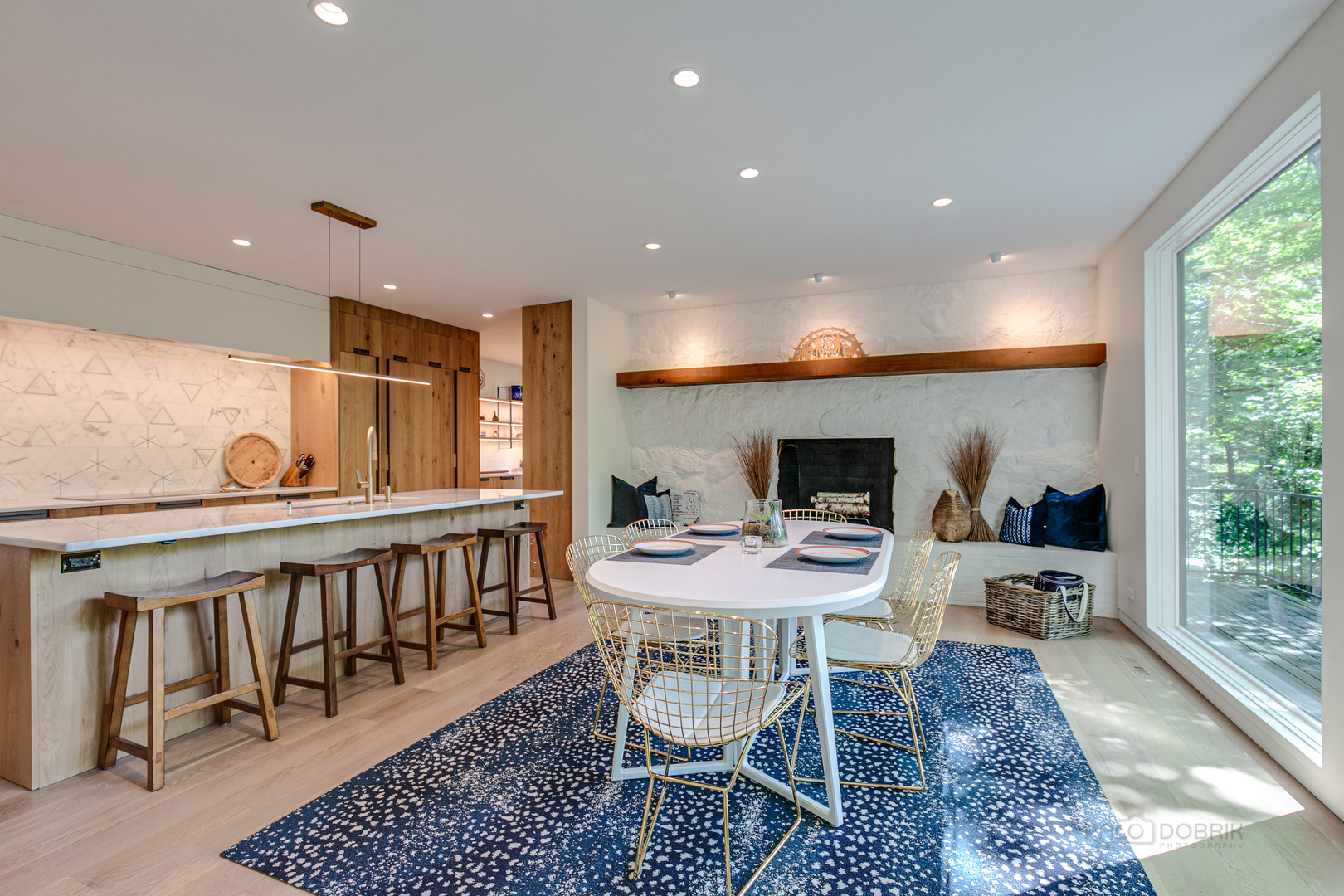 1055 Ringwood Road Lake Forest, IL 60045 - Photo 7 of 59 a dining room with furniture wooden floor and a rug
