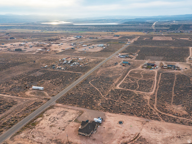4963 20810 West Duchesne, UT 84021 - Photo 28 of 28 Aerial view of property and surrounding area featuring rural landscape and mountains