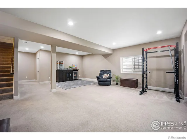 a view of a livingroom with furniture and windows