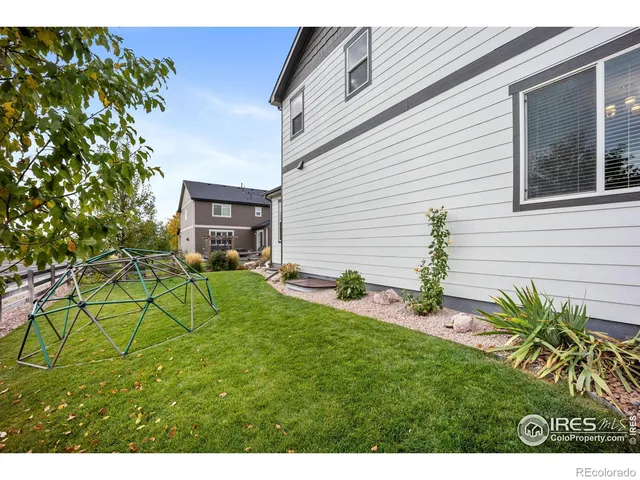 a house view with a backyard space