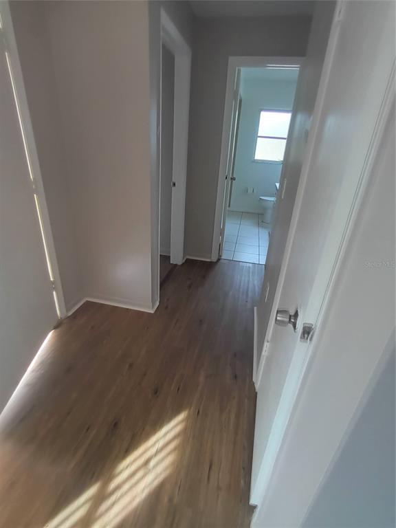 10585 North Spaulding Drive Citrus Springs, FL 34433 - Photo 7 of 18 wooden floor in an empty room