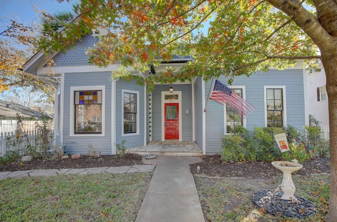 1017 South College Street Georgetown, TX 78626 - Photo 1 of 1 a front view of a house with garden