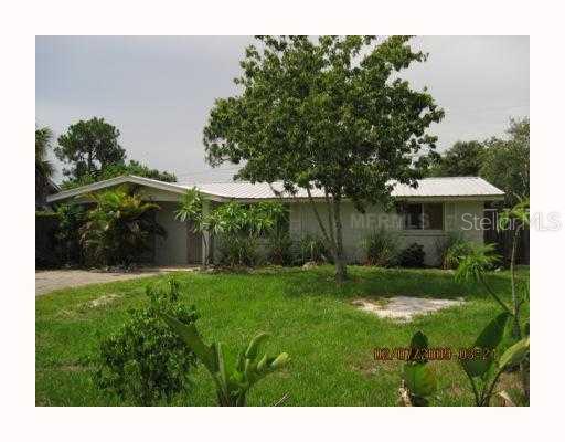8284 Osprey Road Englewood, FL 34224 - Photo 1 of 1 a view of a back yard