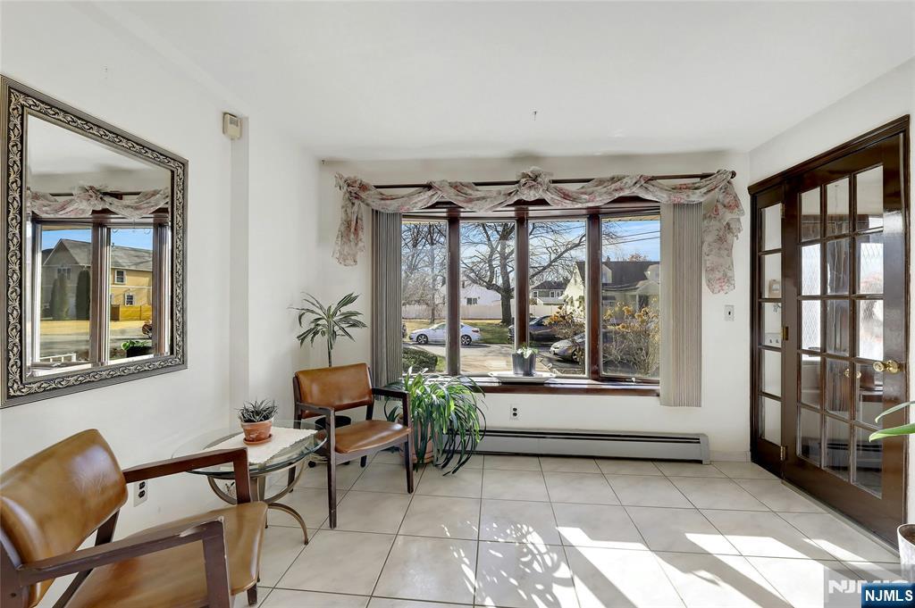 4 Highfield Court Wayne, NJ 07470 - Photo 14 of 49 a living room with furniture and a window