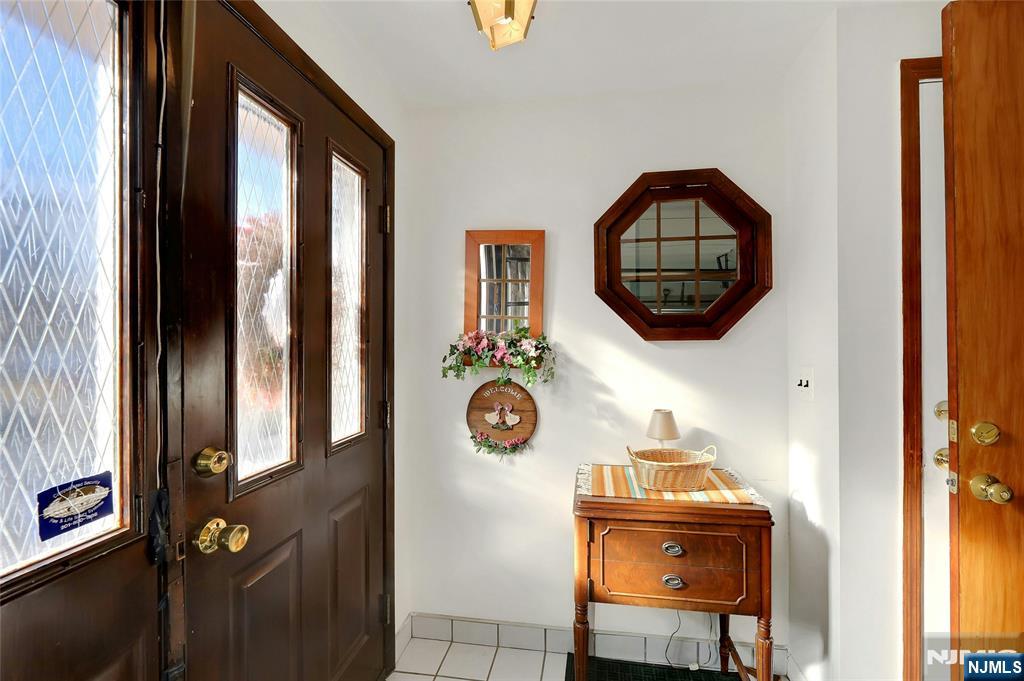 4 Highfield Court Wayne, NJ 07470 - Photo 17 of 49 a view of entryway with wooden floor