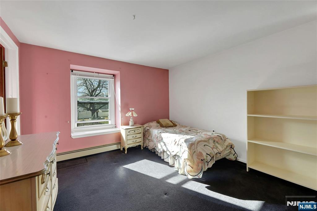 4 Highfield Court Wayne, NJ 07470 - Photo 25 of 49 a bedroom with a bed and a window