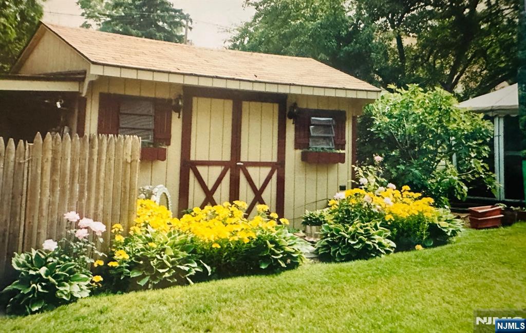 4 Highfield Court Wayne, NJ 07470 - Photo 44 of 49 a front view of a house having a yard