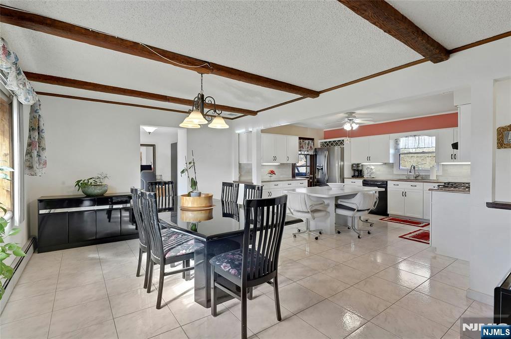 4 Highfield Court Wayne, NJ 07470 - Photo 8 of 49 a view of a dining room with furniture