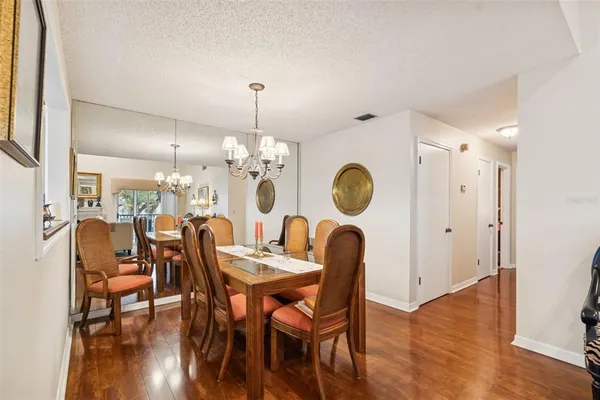 a kitchen with a white cabinets and white appliances