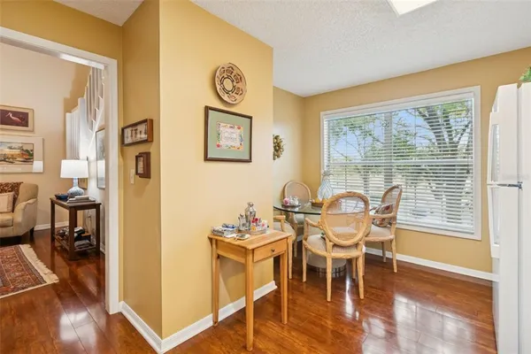 a kitchen with a sink appliances and cabinets